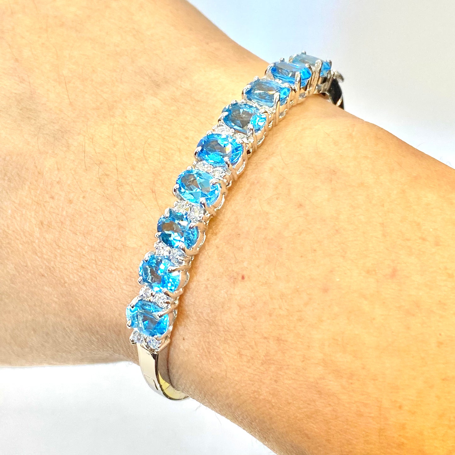 14K White Gold 10.00 Carats Oval Blue Topaz Bangle with Diamonds